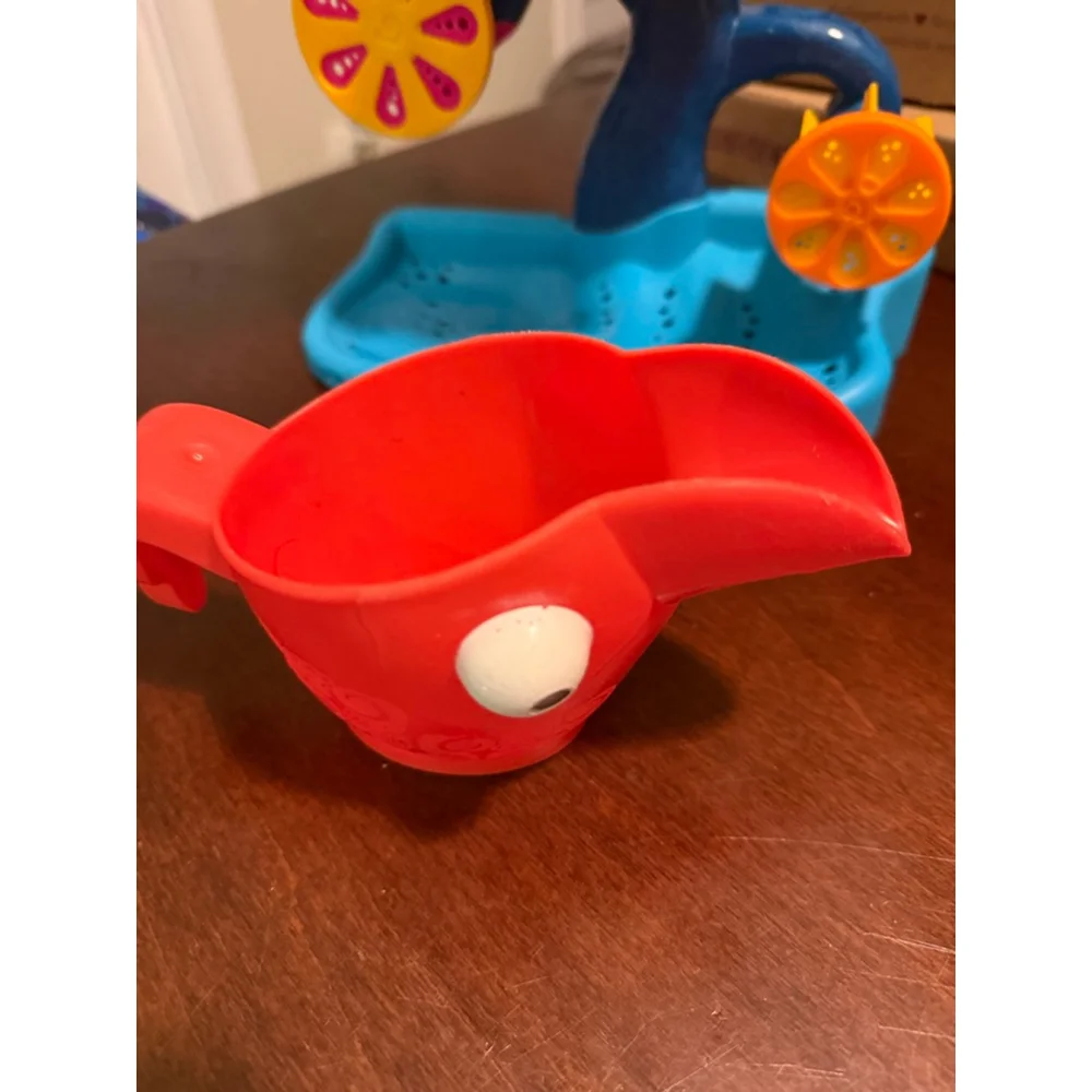 B. Toys Water Wheel Toy Tropical Waterfall with bird cup